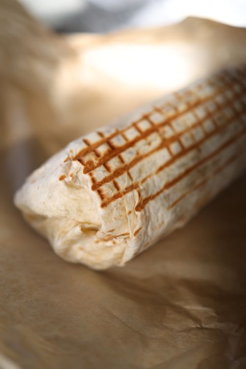 Chicken burritos wrapped and ready to serve